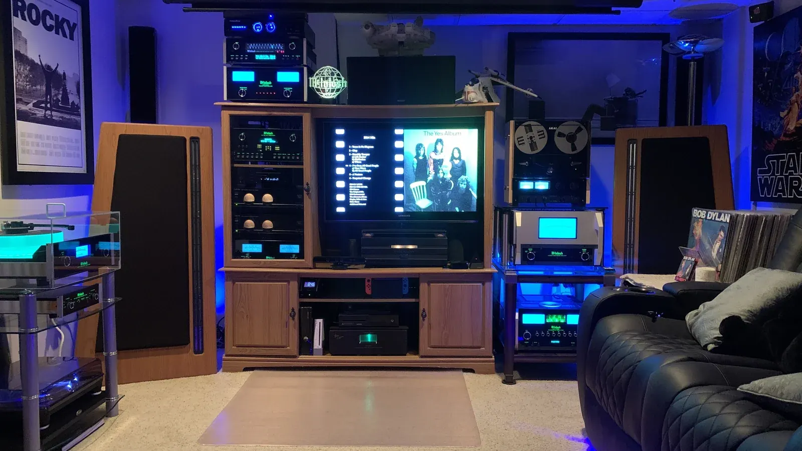 Home theater and media room with a television and sound equipment