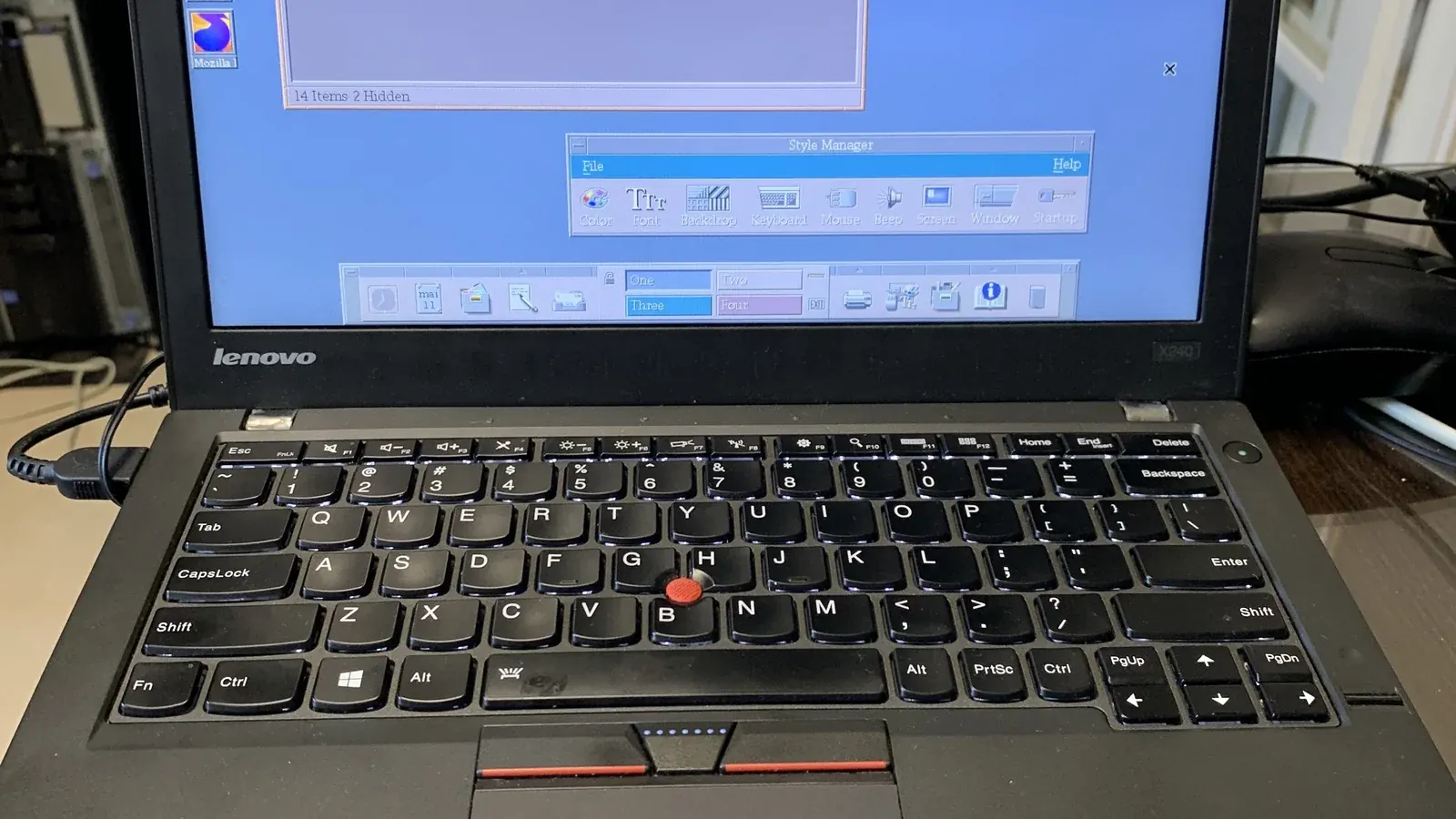 Laptop computer open on a desk